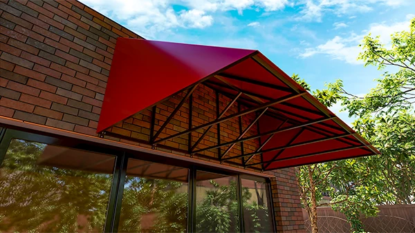 Red metal awning over cafe windows